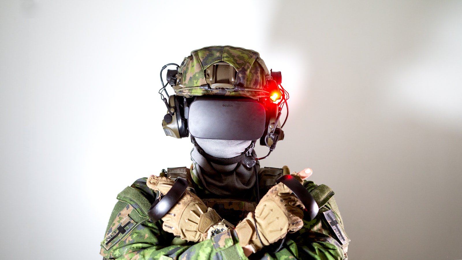 Operator wearing a VR headset with neural sensors in a control room